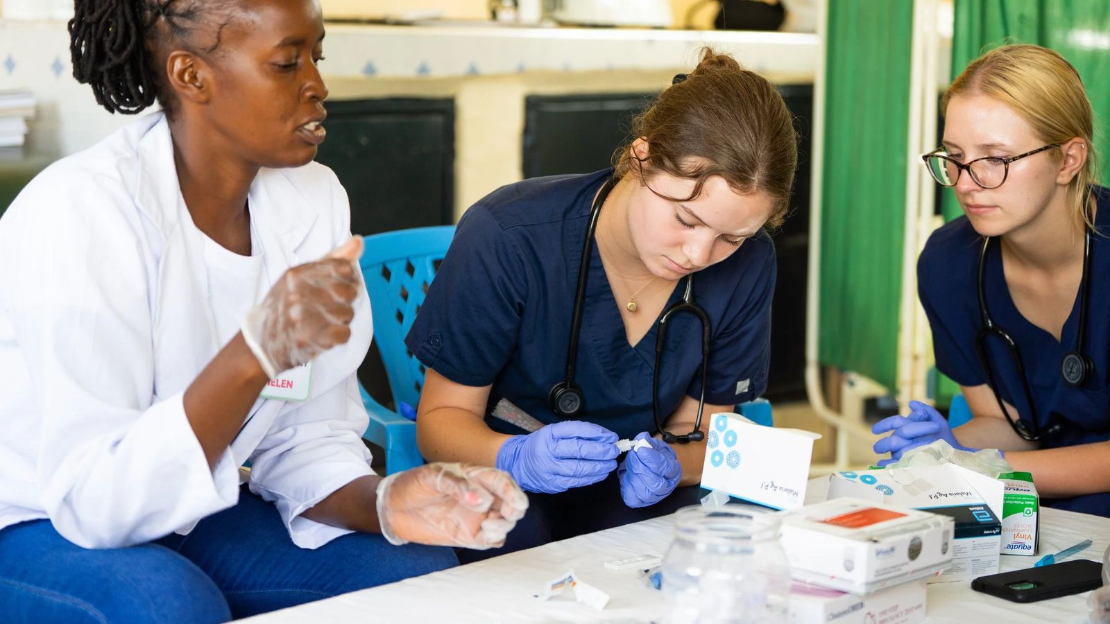 Nursing students preparing supplies