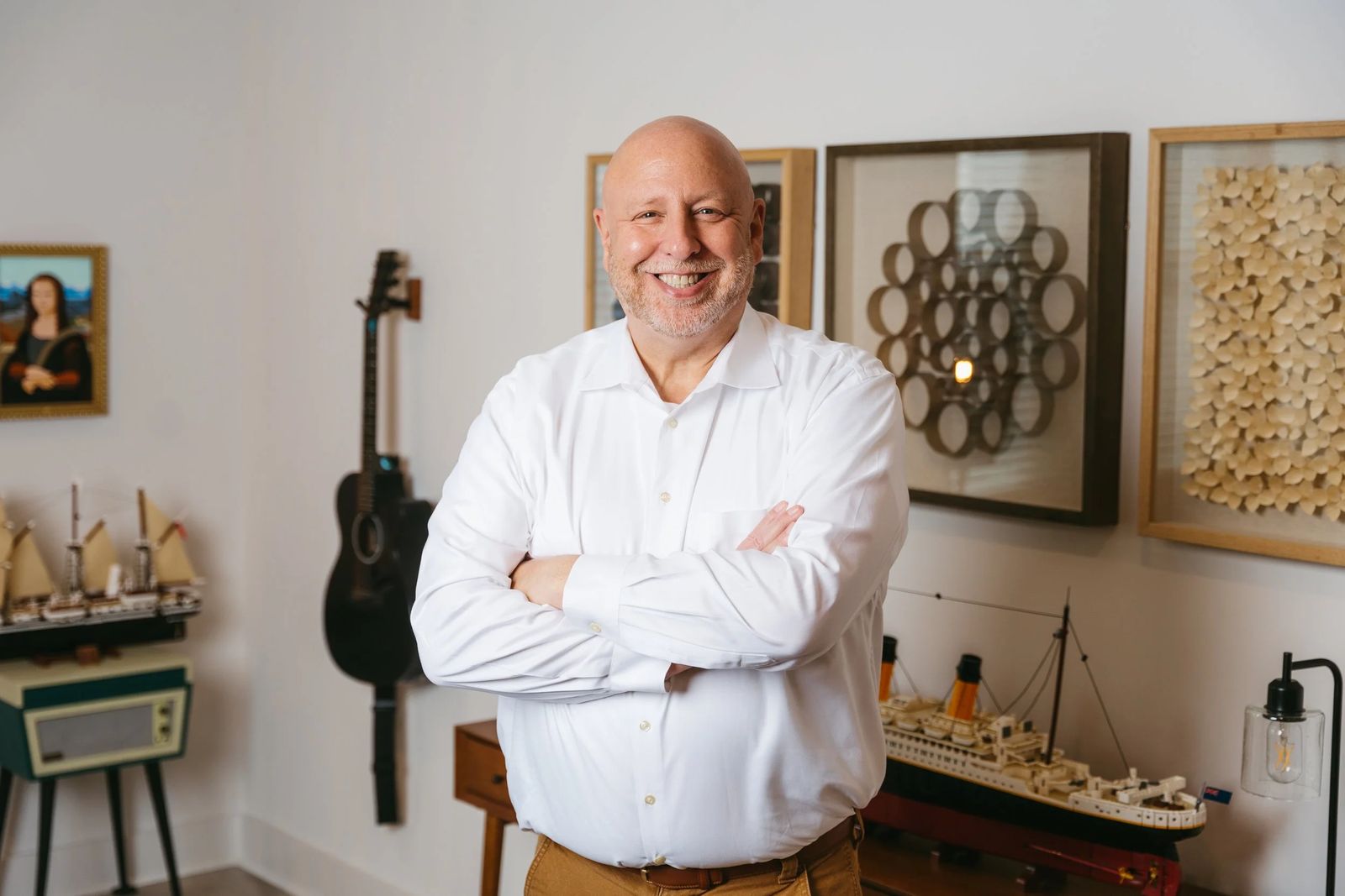 An agent portrait in a styled room