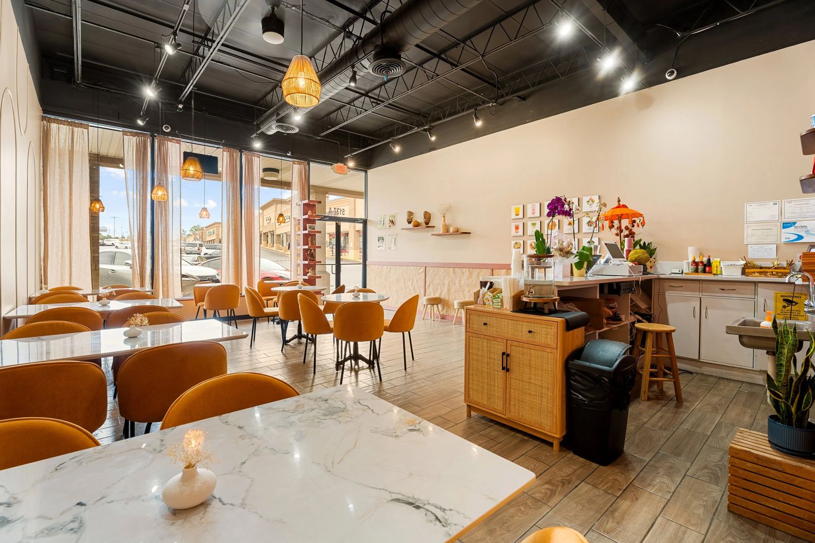 The warm, light-filled dining room at Gula